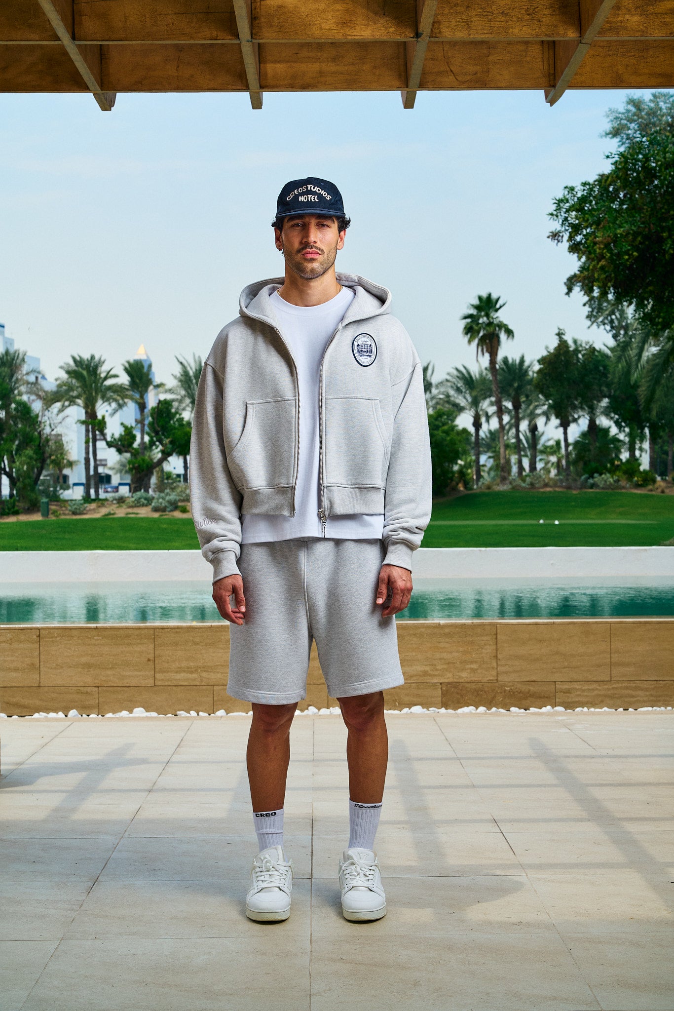 St. Tropez Hotel Zip-Through Hoodie in grey marl by Creo Studios