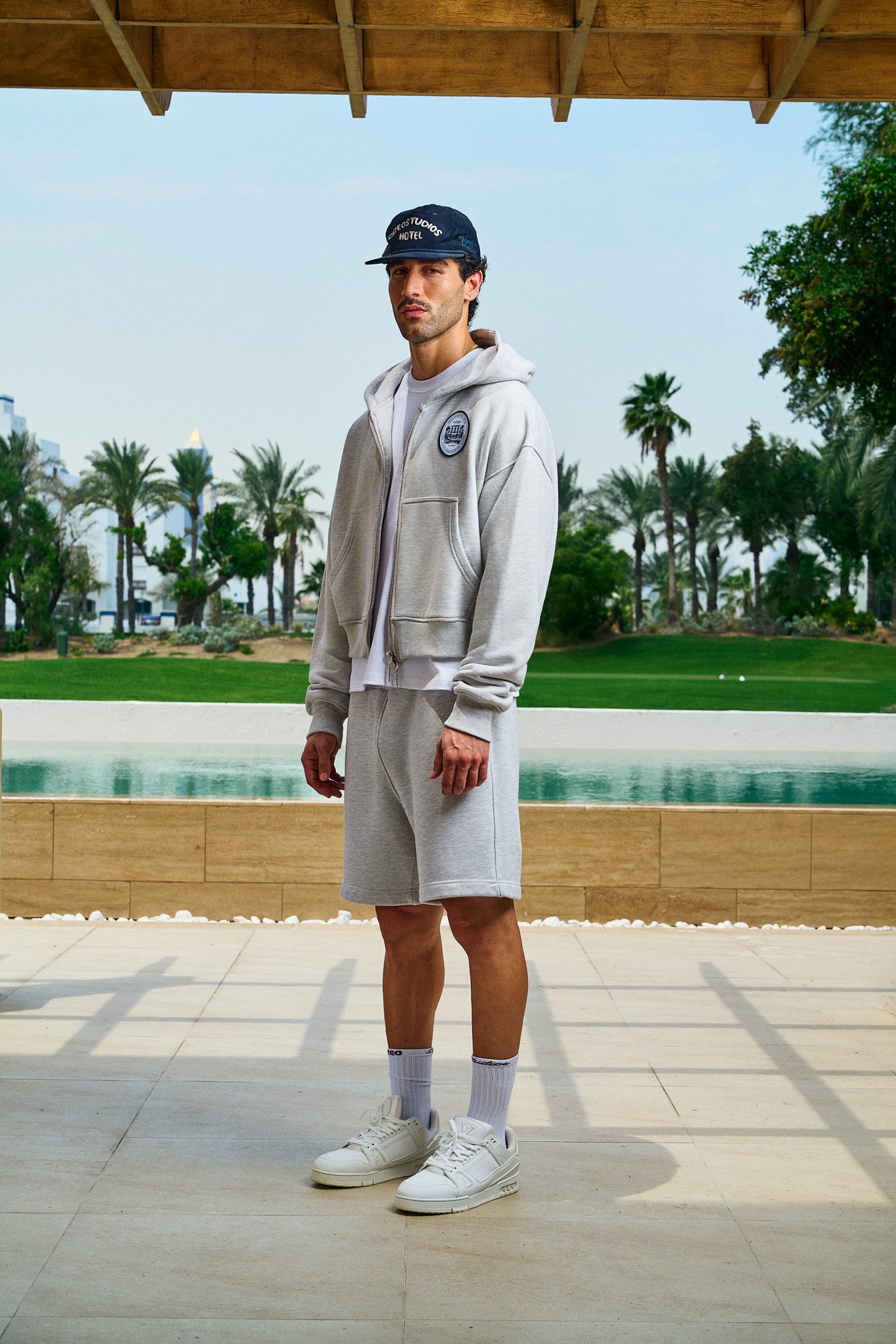 St. Tropez Hotel Zip-Through Hoodie in grey marl by Creo Studios