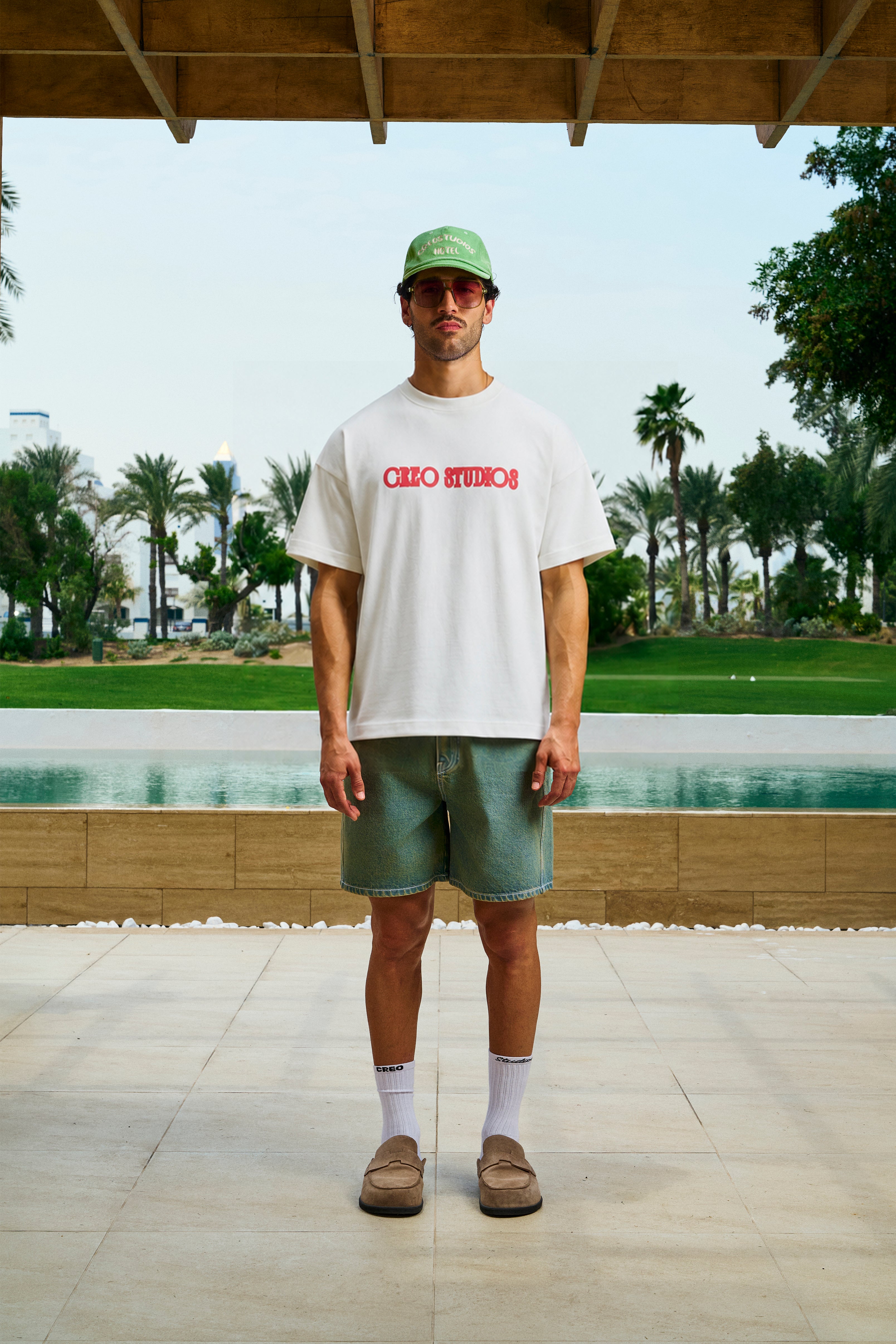 Off The Bloc Tee unisex cotton t-shirt in off-white by Creo Studios