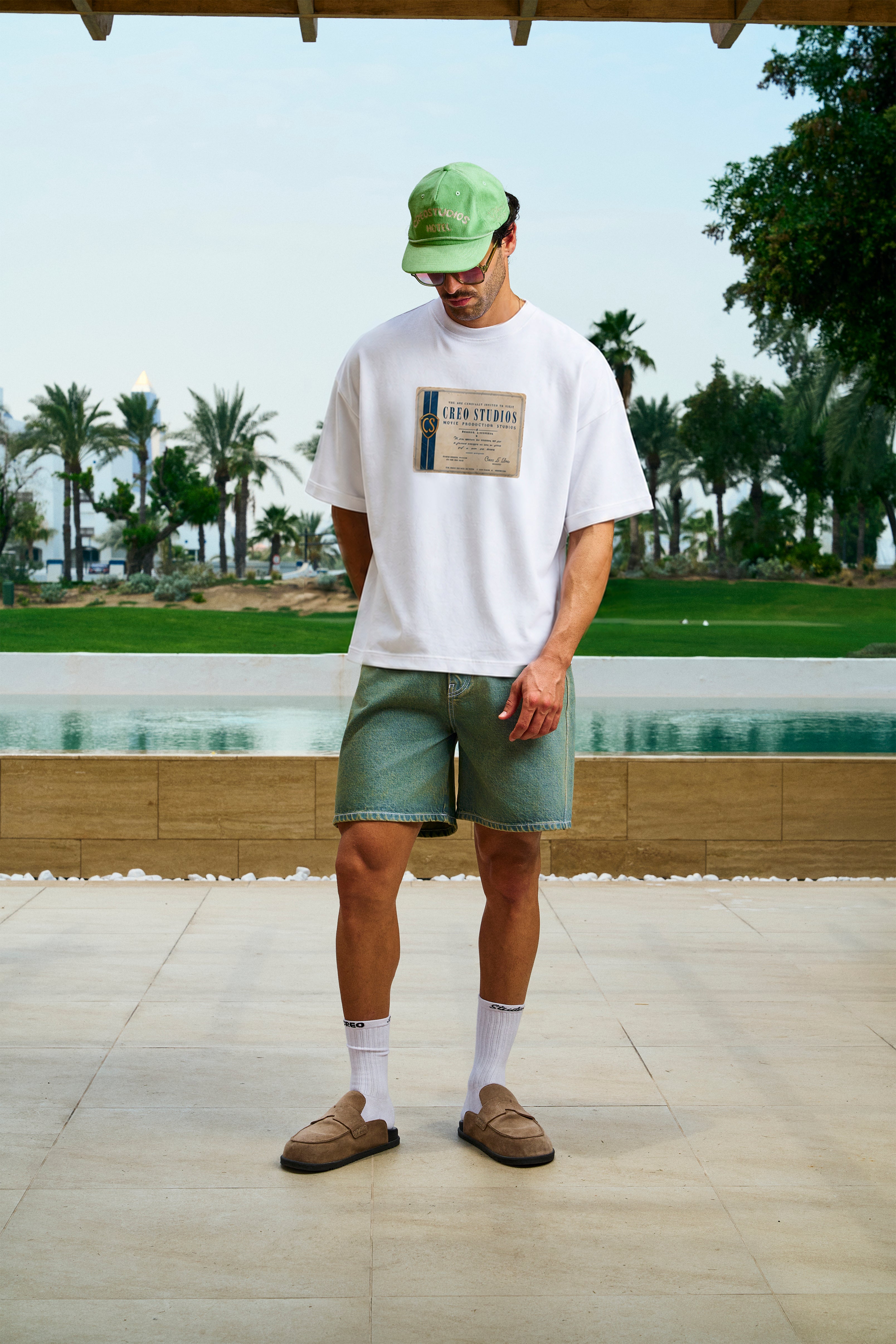 Invitation Tee unisex cotton t-shirt in white by Creo Studios