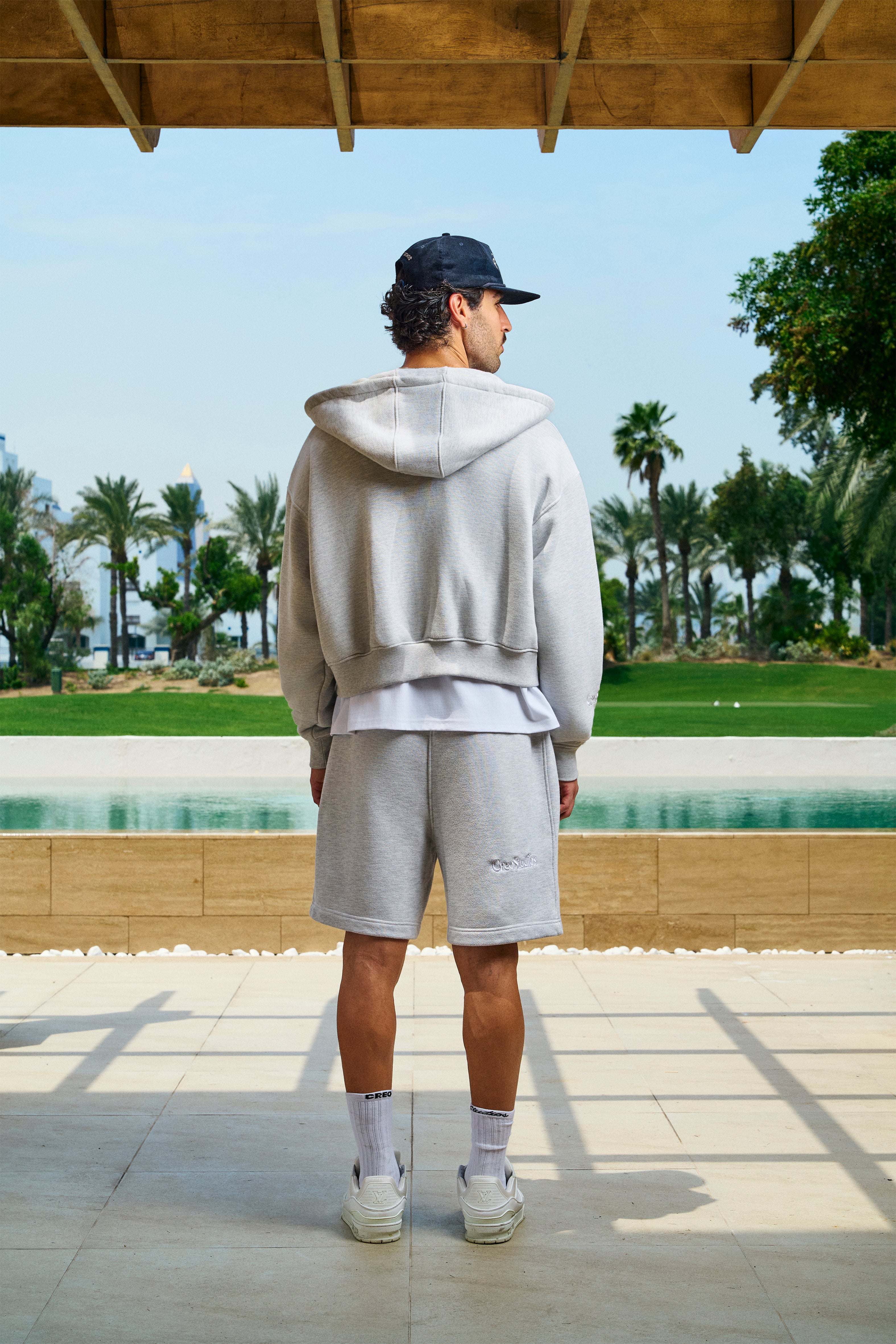 St. Tropez Hotel Zip-Through Hoodie in grey marl by Creo Studios
