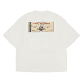 Trouble in St. Tropez Tee unisex cotton t-shirt in off-white by Creo Studios